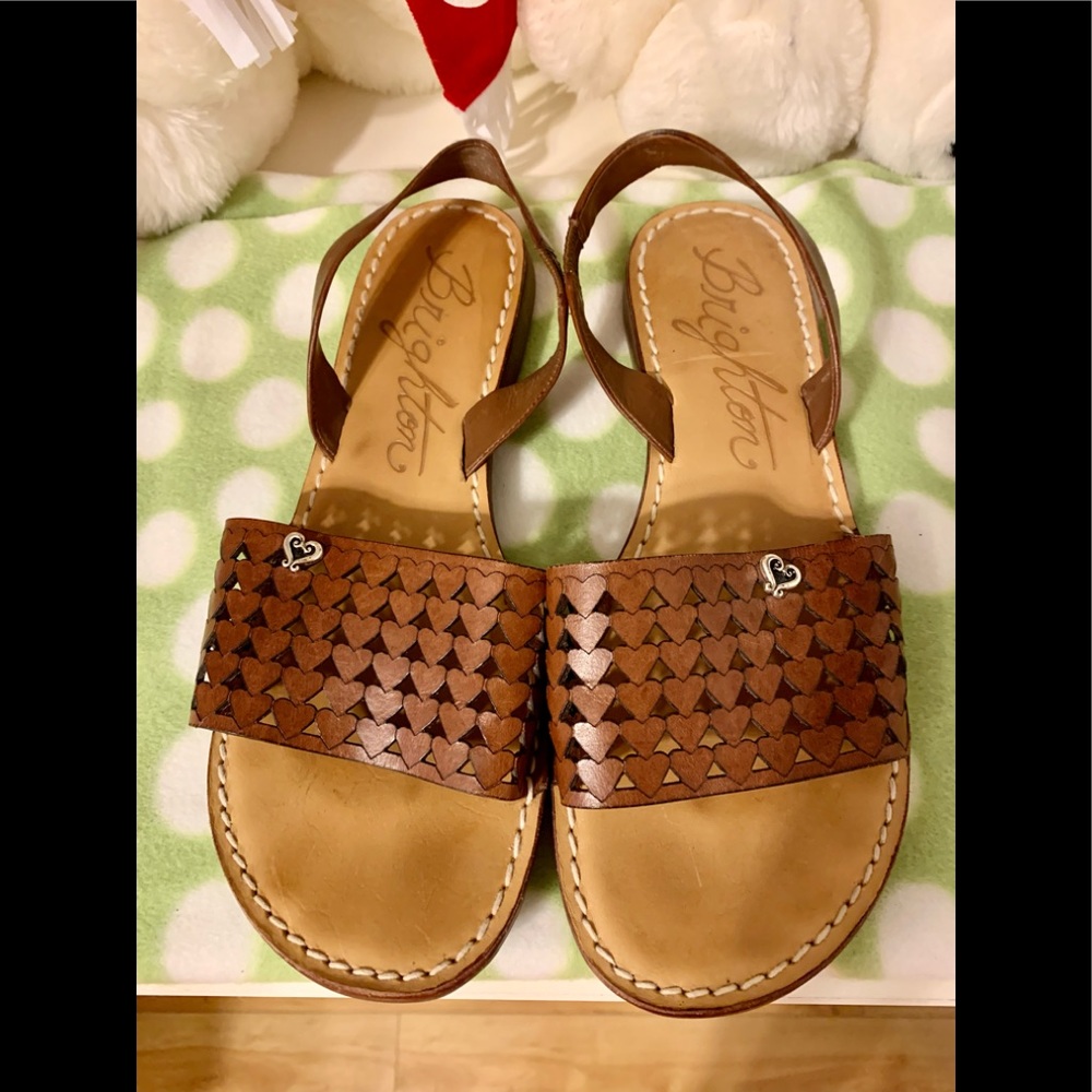 Brighton women’s sandals fits like size 10 wide. Actual size size 9.5 M